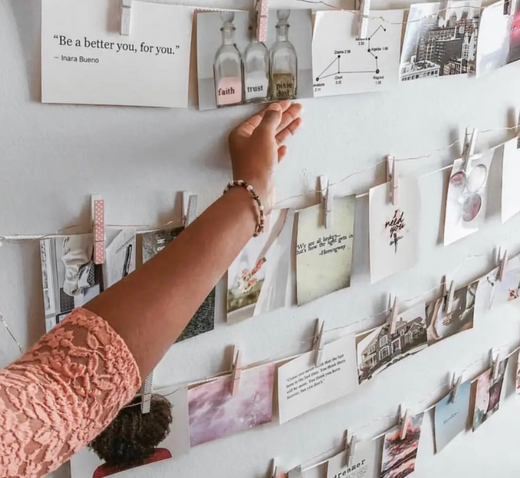 images pegged onto a washing line display